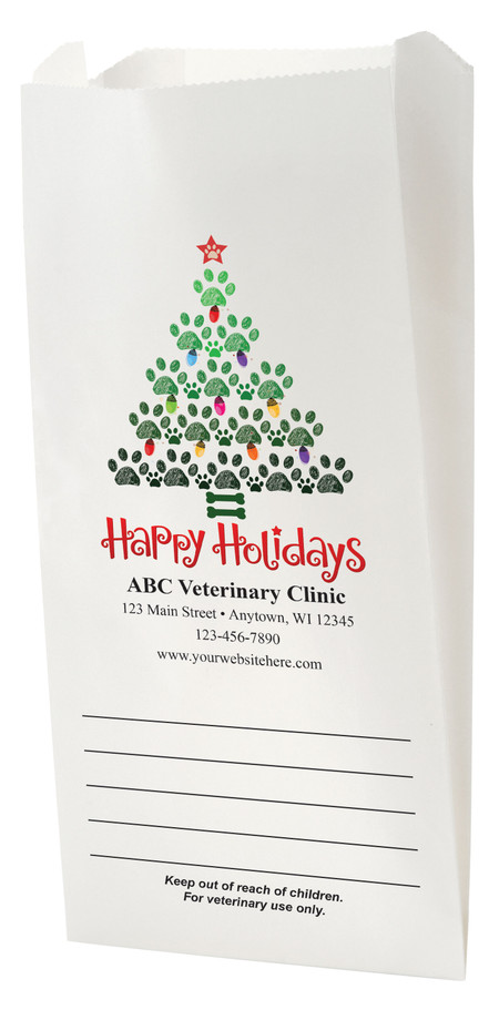 White Paper veterinary prescription bag with holiday paw print tree design.