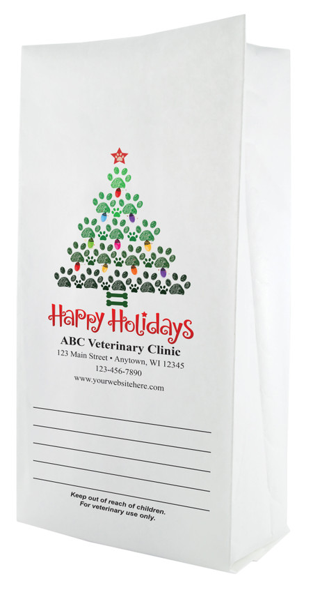 White paper veterinary prescription bag featuring veterinary prescription bags with paw print Christmas tree and Happy Holidays design