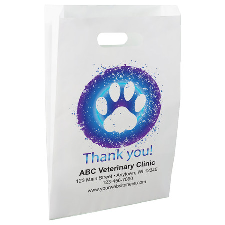 White die-cut handle paper bag featuring a blue and purple circular paw print graphic with white paint splatter accents and the message "Thank you!"

