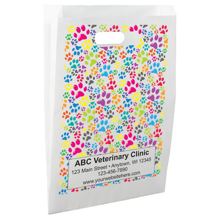 White die-cut handle paper bag featuring a repeating pattern of colorful paw prints in pink, purple, blue, green, yellow, orange, teal, and gray.

