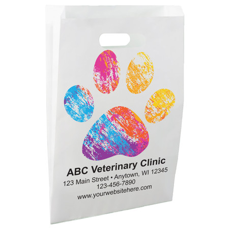 White die-cut handle paper bag featuring a large multicolored paint-style paw print design.

