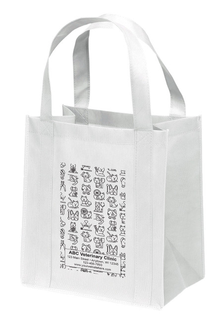A reusable non-woven veterinary tote bag featuring an all-over doodle pattern of dog faces, cat faces, paw prints, bones, grooming tools, and veterinary-themed icons. Personalized clinic information is displayed in a rectangular text panel positioned near the bottom of the design.