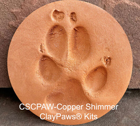 Copper Shimmer ClayPaws® pet paw print impression made from copper-colored modeling compound with a subtle shimmer finish and soft metallic appearance.

