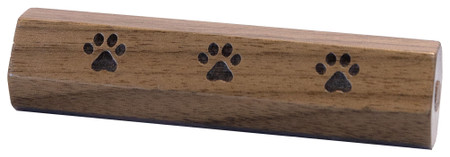Walnut wooden memorial vial engraved with three pawprints across the front and designed to hold a small portion of cremated remains.