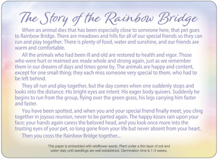 Wildflower seed memorial insert featuring The Story of the Rainbow Bridge text on a soft pastel background with lavender, pink, blue, yellow, and green tones.