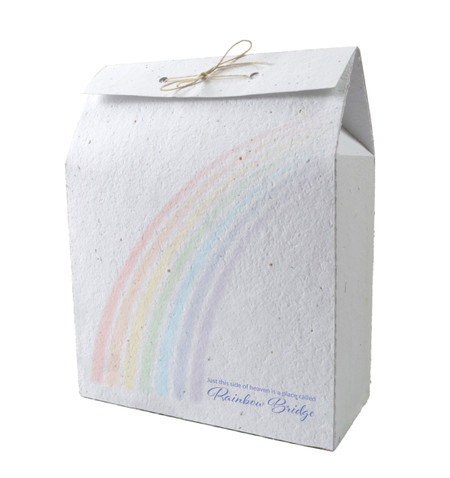 Plantable memorial bag featuring a pastel rainbow and the message “Just this side of heaven is a place called Rainbow Bridge.”