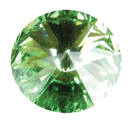 Round August crystal gemstone with a light green faceted design and reflective surface, suitable for memorial keepsakes, remembrance products, and memorial jewelry.

