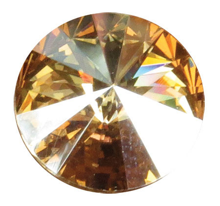 Round November crystal gemstone with a golden amber faceted design and reflective surface, shown individually and displayed as an accent option on a memorial paw print keepsake.

