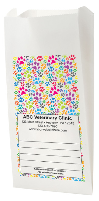 White Paper veterinary prescription bag with colorful paw print pattern design.