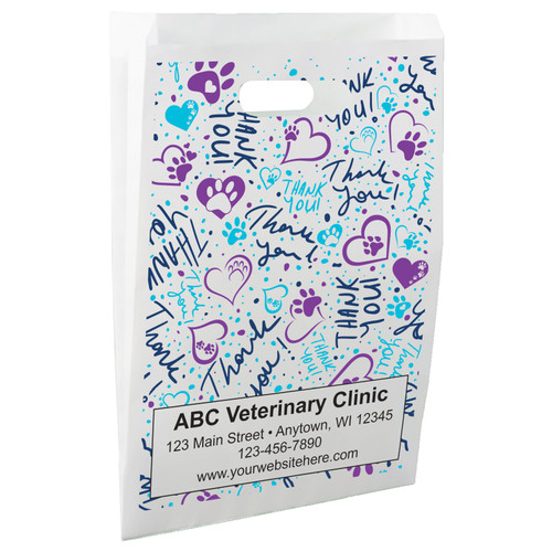 White die-cut handle paper bag featuring blue and purple hearts, paw prints, and repeating Thank You messages in a full-coverage pattern.

