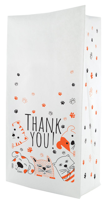 A flat bottom bag with a white surface features black and orange paw prints, playful illustrated animal faces, and the bold text “THANK YOU!” on the front.

