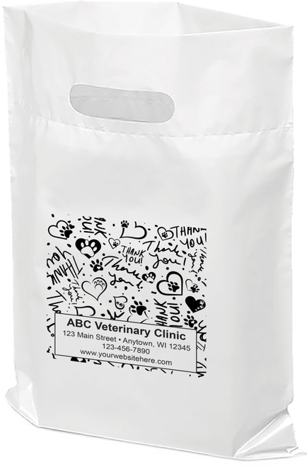 White plastic veterinary tote bag with a die-cut handle featuring a black pattern of paw prints, hearts, and repeated "Thank You" text surrounding a personalized clinic information panel displaying ABC Veterinary Clinic, address, phone number, and website.