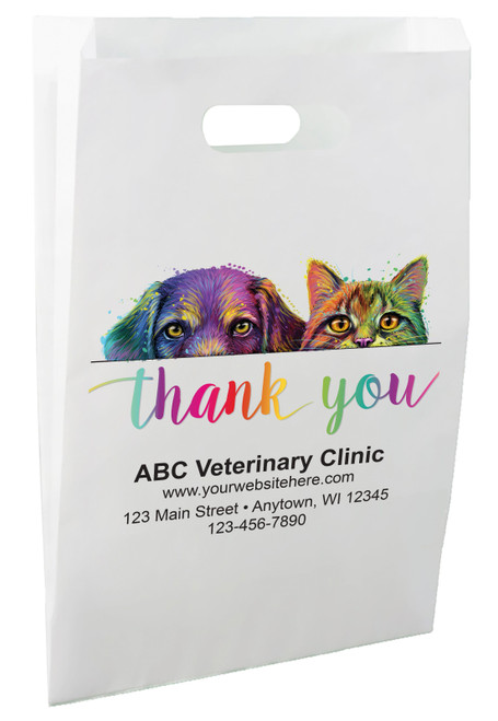 White die-cut handle paper bag featuring colorful artistic dog and cat portraits above a multicolored "thank you" message.

