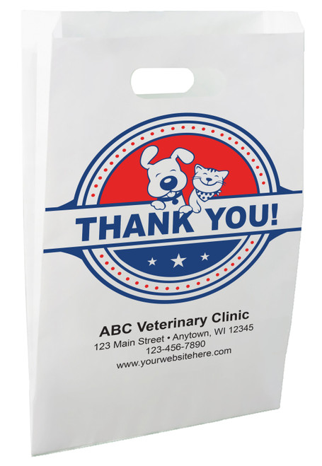 White die-cut handle paper bag featuring a red, white, and blue thank you badge with illustrated dog and cat characters and the message "THANK YOU!"