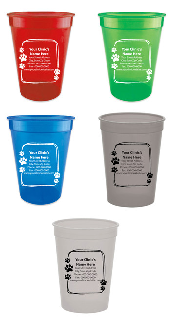 Personalized pet food measuring cup featuring a sketch-style rectangular border with paw print accents surrounding a custom clinic name, address, phone number, fax number, and website imprint area.