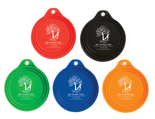 Personalized pet food can cover featuring a large tree, sitting dog silhouette, thank you message, and custom veterinary clinic contact information.

