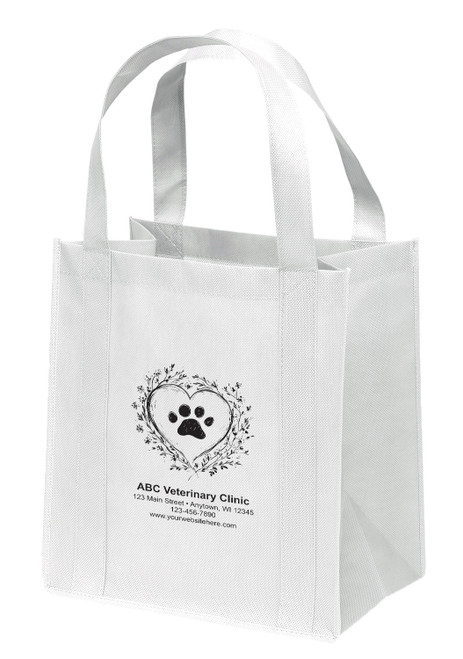 Non-woven tote bag with floral heart and paw print design.
