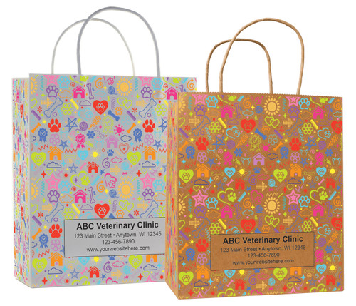 White and kraft veterinary handled bags with colorful pet icon pattern including paw prints bones hearts and a centered label panel