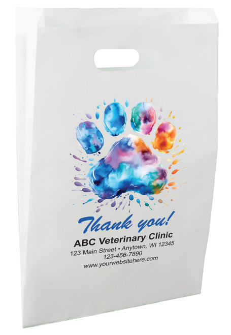 White die-cut handle paper bag featuring a colorful watercolor paw print with paint splash accents and a blue Thank You message.

