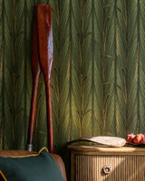 DANUBE FOLIAGE Peridot Wallpaper (WP30218) by Mind The Gap | WP30218 | THE WETLANDS | 1 roll x 52 x 1000 cm / 20.5x393.7 in | 0.52m / 20.5in | 10m / 393.7in | 5.20sqm / 55.9sq ft | 60cm / 23.6in | Green, Ochre | Non-woven Satin | Paste the wall | 1 roll in a box | Fabric Carolina | https://www.fabriccarolina.com/