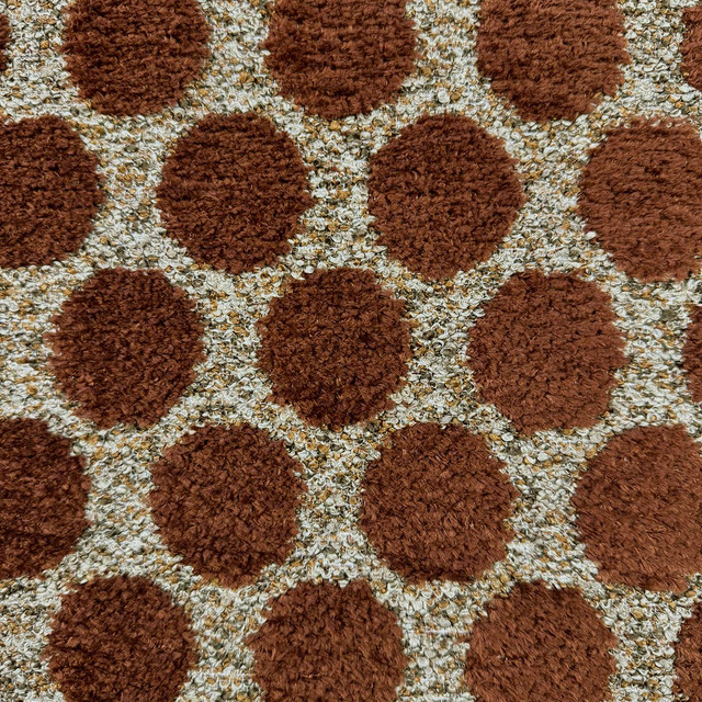 Domino Garnet by Magnolia Designer Fabric Required Minimum Quantity Purchase: 2 yards Content: 92% POLYESTER, 8% COTTON Origin: INDIA Performance: 50,000+ WYZ Repeat: Horizontal: 2.25 and Vertical: 3.25 Width: 54 Uses: Upholstery