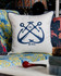 VINTAGE ANCHORS Linen Embroidered Cushion (LC40106) by Mind The Gap | LC40106 | SUNDANCE VILLA | 50 x 50 cm | Blue, White | Indigo blue rope border | Duck feather | 100% Linen | Fabric Carolina | https://www.fabriccarolina.com/