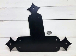 Bia Finial Angled T-Bracket
These custom Bia Finial Angled T-brackets are the perfect decorative compliment for the corners on your truss. We make truss plates to any size, angle, thickness, hole placement and size or finish. To order yours or for any questions, give us a call at (715) 718-0781.