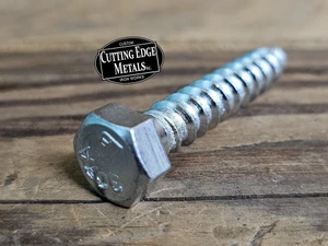 "1/4 inch hex head lag screws in zinc plated and unfinished plain steel displayed on shelf – 1.5 to 4 inch lengths from Cutting Edge Metals"