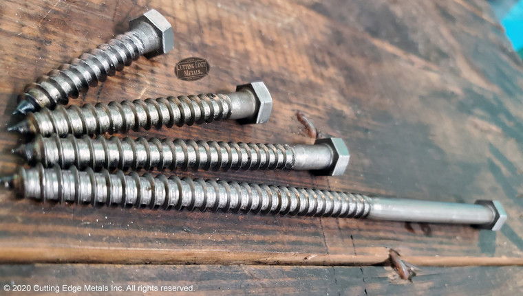 "Unfinished hex head lag screws in plain steel displayed on shelf – raw rustic lag bolts from Cutting Edge Metals for timber projects"