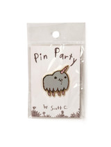 Unicorn enamel pin in package