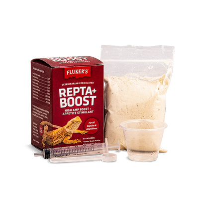 Repta Boost box with contents: 50 grams of power boost powder, measuring cup, spoon, and feeding syringe.