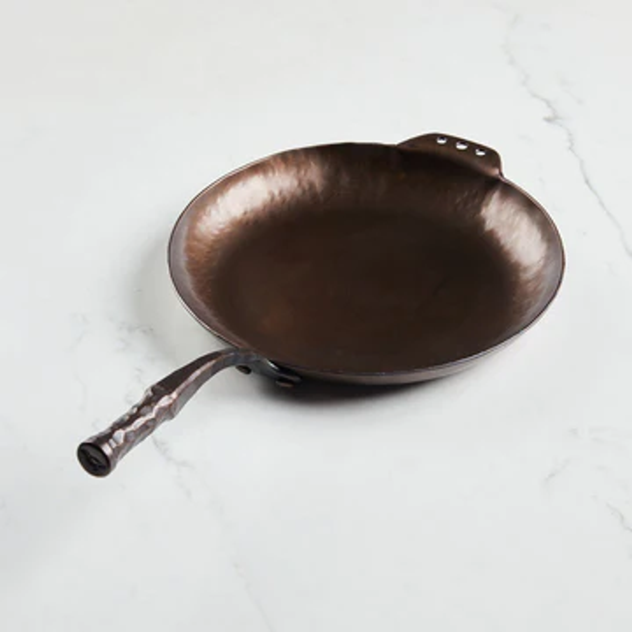 https://cdn11.bigcommerce.com/s-kk2jd0cxqh/images/stencil/1280x1280/products/16772/10471/smithey-carbon-steel-farmhouse-skillet__21479.1655587390.png?c=1