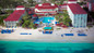 Aerial view of the Breezes Resort Nassau property beach area. 