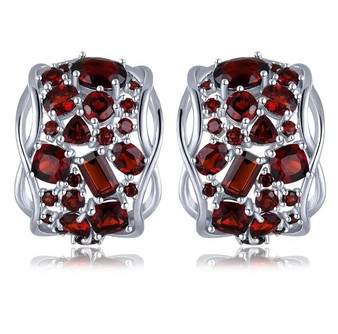 back view of garnet or sky blue topaz cluster omega back earrings in rhodium over sterling silver
