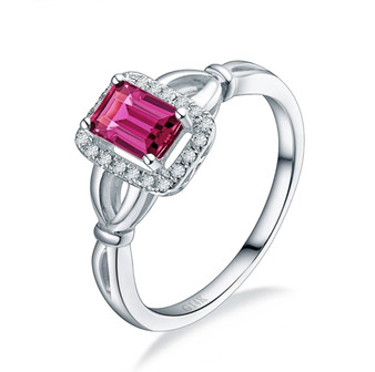 pink tourmaline and diamond halo ring in 14k white gold