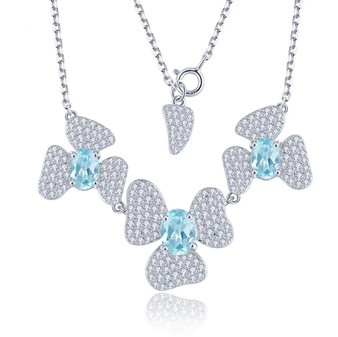 sky blue topaz and zircon flowering necklace in rhodium over sterling silver