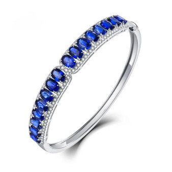 sapphire and diamond bangle bracelet in 18k white gold