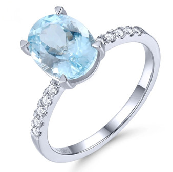 front view of oval aquamarine and diamond ring in 14k white gold