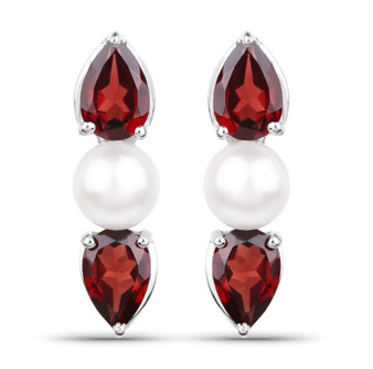 front view of garnet and freshwater pearl three stone earrings in rhodium over sterling silver