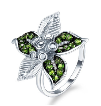 front view of chrome diopside and white zircon flower ring in sterling silver