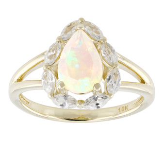 ethiopian opal and white zircon split shank halo ring in 10k yellow gold