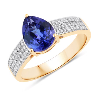 pear cut tanzanite and diamond ring in 14k yellow gold