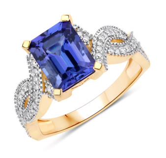 emerald cut tanzanite and diamond ring in 14k yellow gold