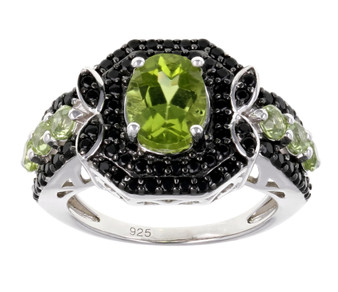 peridot and black spinel halo ring in black and white rhodium over sterling silver