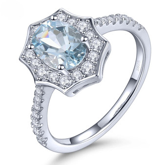 aquamarine and white zircon halo ring in rhodium over sterling silver