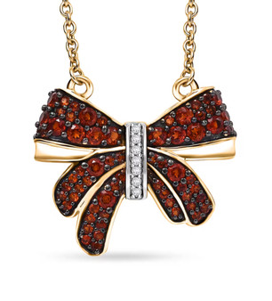 garnet and white zircon bow necklace in 18k yellow gold over sterling silver