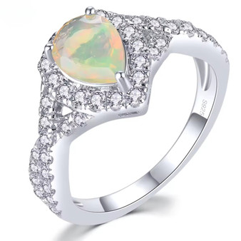 ethiopian opal and white zircon halo ring in rhodium over sterling silver