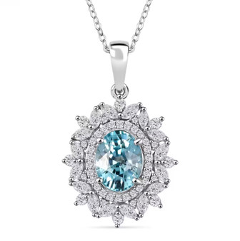 oval blue zircon and white zircon double halo pendant necklace in rhodium over sterling silver