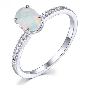 oval ethiopian opal and white zircon halo ring in rhodium over sterling silver