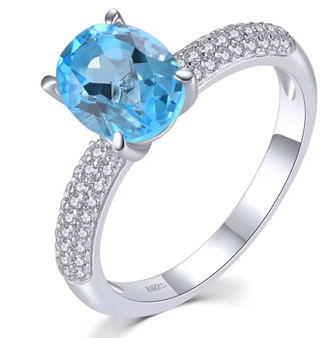 swiss blue topaz and white zircon solitaire ring in rhodium over sterling silver